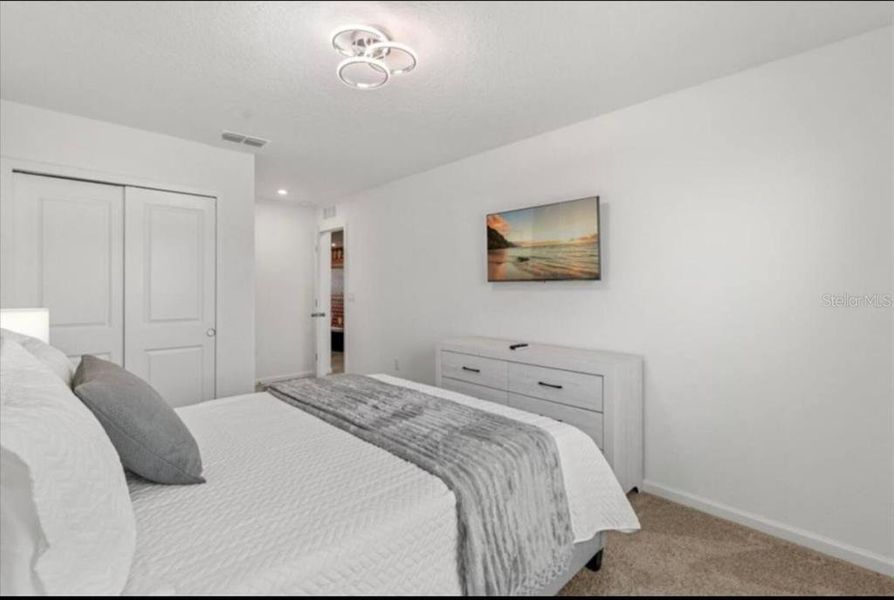 Furnished interior view inside a new home in , Kissimmee (Image 18).