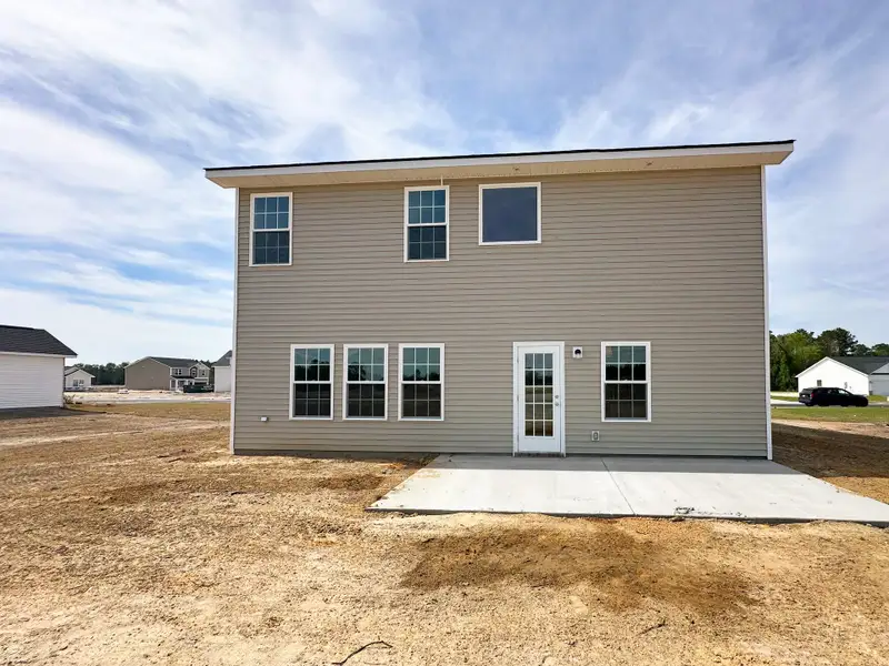Exterior details and patio area of a home in Doctor's Creek, Ludowici (Image 2).
