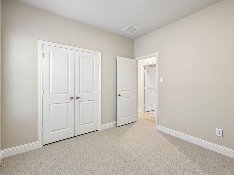 Spacious, unfurnished interior of a new home in Parks at Foster Crossing - Spring Series, Anna (Image 12). Spacious, unfurnished interior of a new home in Parks at Foster Crossing - Spring Series, Anna (Image 12).