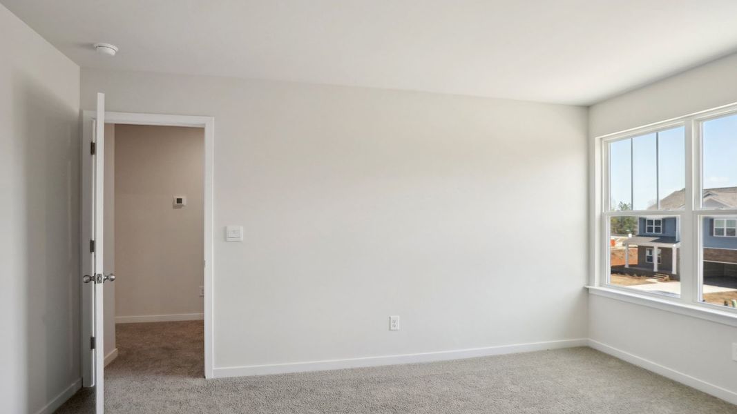Spacious, unfurnished interior of a new home in Tap Root Farms, Fletcher (Image 17).