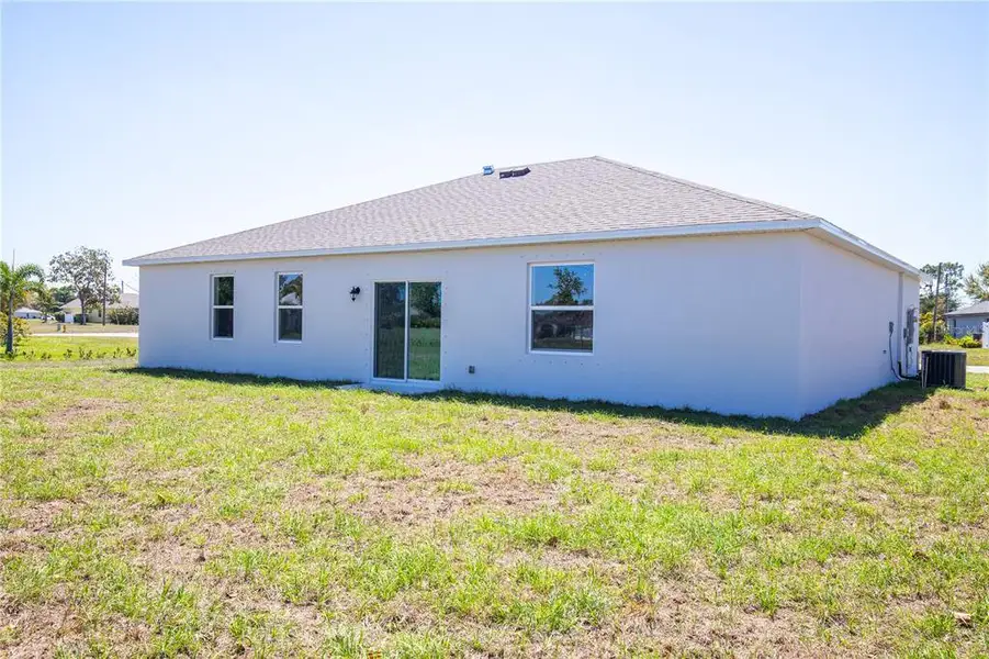Exterior details and patio area of a home in Burnt Store Village, Punta Gorda (Image 4).