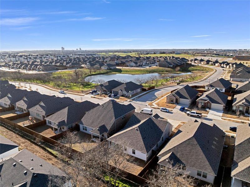 Drone / aerial view featuring a residential view and a water view