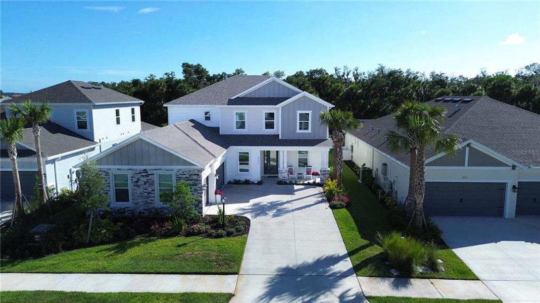 Front exterior of a new home in , Sarasota, FL, highlighting curb appeal (Image 20).