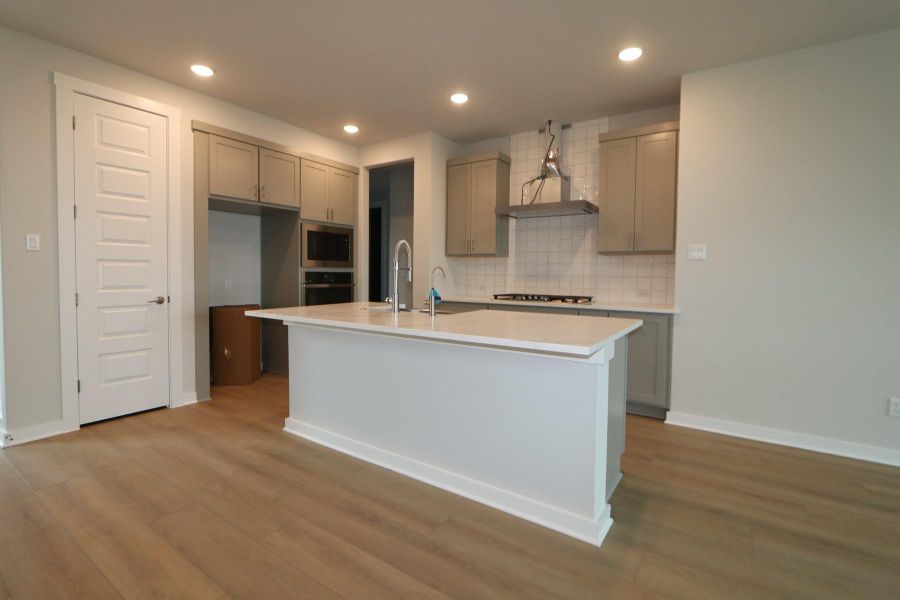 Furnished interior view inside a new home in Flora, Hutto (Image 14).