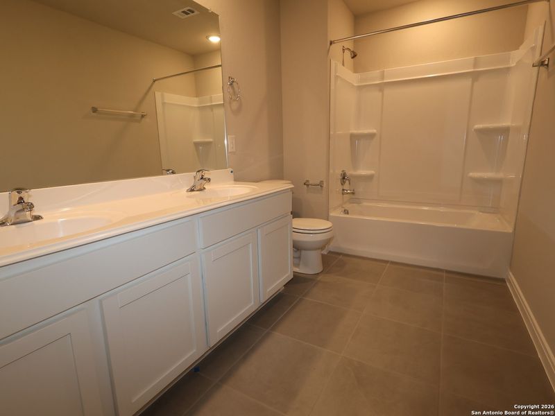 Furnished interior view inside a new home in Paloma Park, Converse (Image 11).