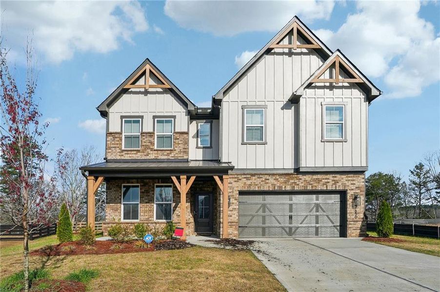 Front exterior of a new home in Tiberon Woods, Cumming, GA, highlighting curb appeal (Image 29). Front exterior of a new home in Tiberon Woods, Cumming, GA, highlighting curb appeal (Image 29).