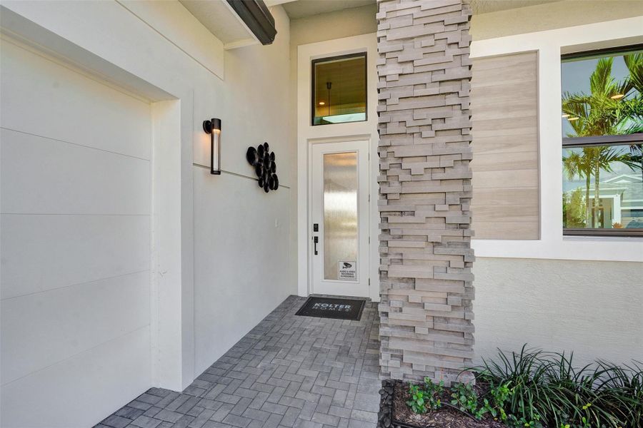 Exterior details and patio area of a home in Esprit at Avenir, Palm Beach Gardens (Image 3).