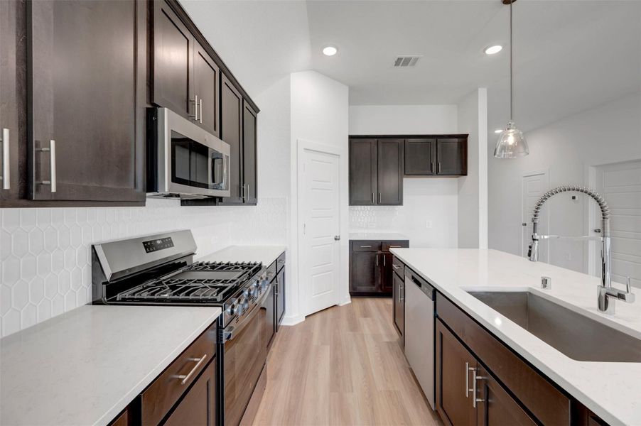 Furnished interior view inside a new home in Lone Star Landing, Montgomery (Image 6).