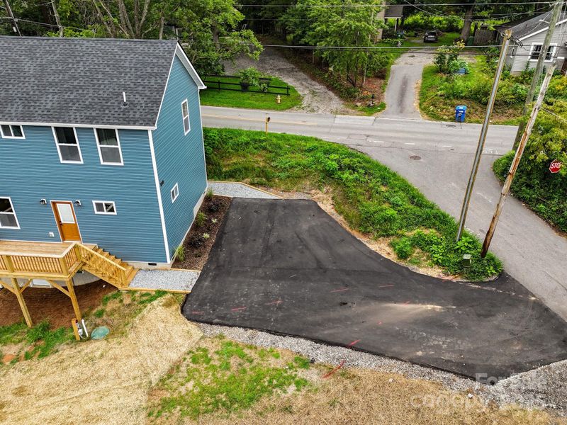 Front exterior of a new home in , Asheville, NC, highlighting curb appeal (Image 25).