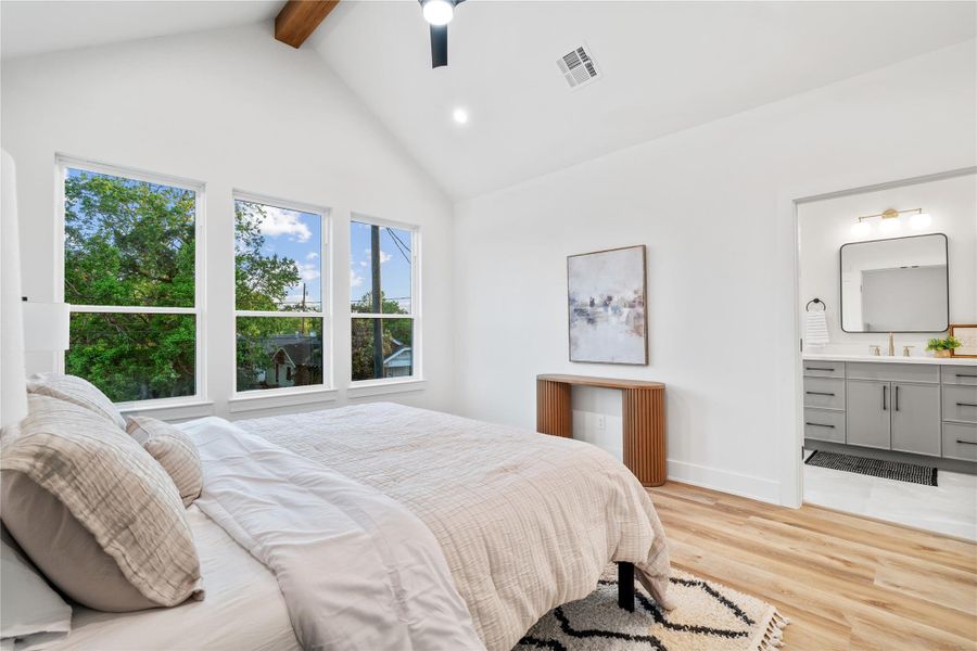 The spacious layout provides room for a sitting area or workspace. The spacious layout provides room for a sitting area or workspace.