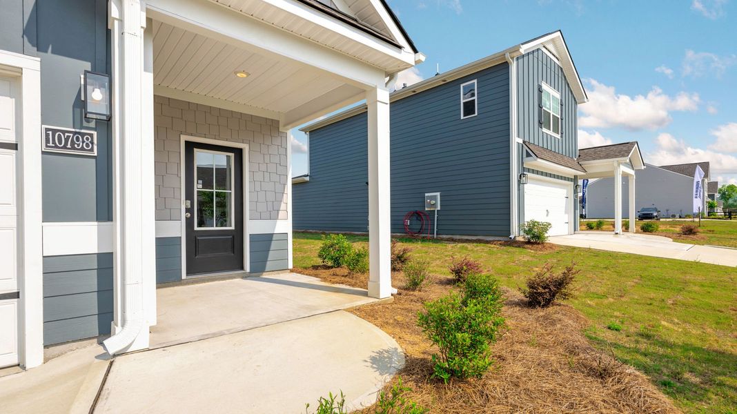 Front exterior of a new home in Fairview Hills, Cleveland, TN, highlighting curb appeal (Image 22). Front exterior of a new home in Fairview Hills, Cleveland, TN, highlighting curb appeal (Image 22).
