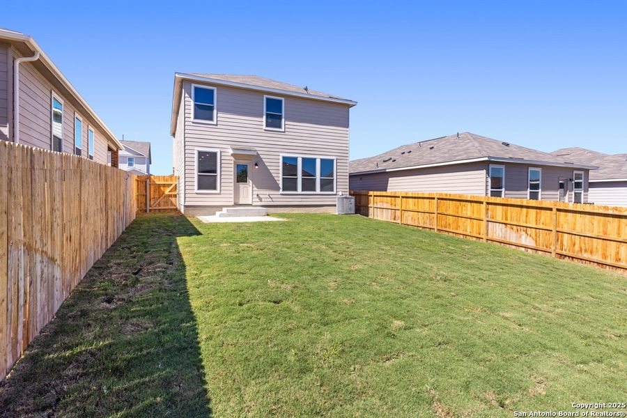 Exterior details and patio area of a home in Knox Ridge, Converse (Image 2). Exterior details and patio area of a home in Knox Ridge, Converse (Image 2).