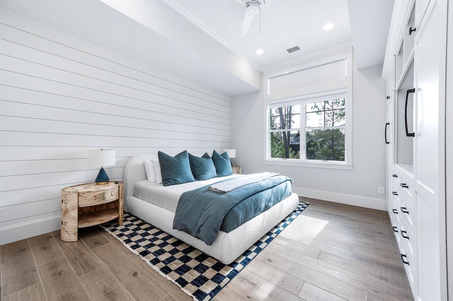 Cypress Cottage comes with elevated ceilings and custom cabinetry. 1 of 4 bedrooms.