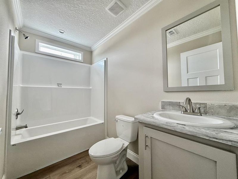 Furnished interior view inside a new home in , Okeechobee (Image 17).