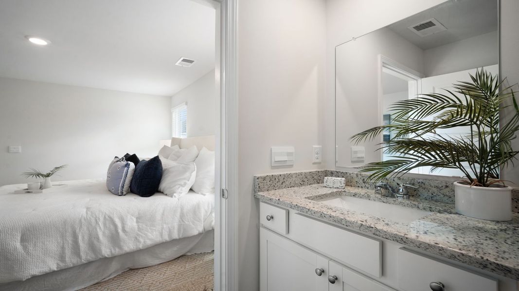 Representative furnished interior of a home built from the Downing by D.R. Horton in Palm Ridge, Guyton (Image 7).