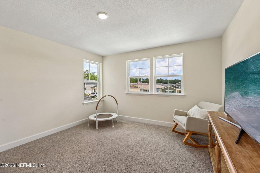 Furnished interior view inside a new home in Seasons at Morada, St. Augustine (Image 34).