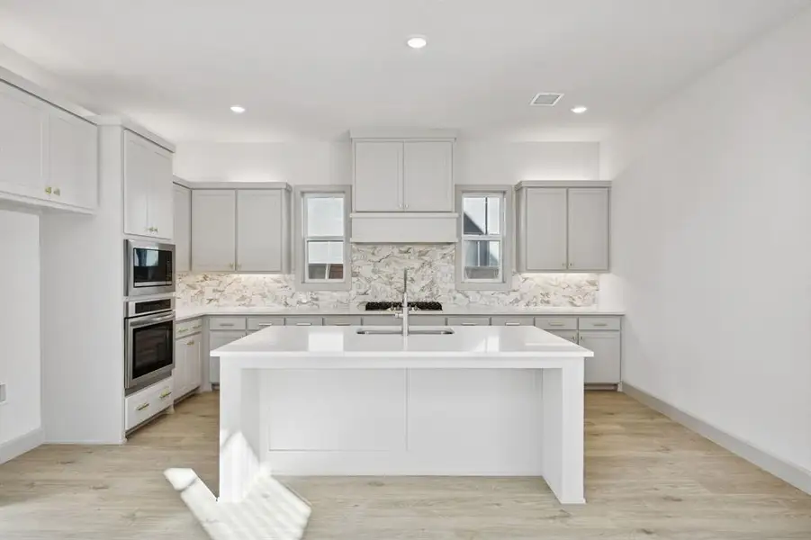 The spacious island is the hub of your new dream kitchen! The spacious island is the hub of your new dream kitchen!