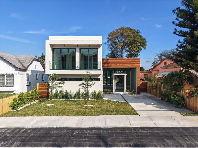 Front exterior of a new home in , Miami, FL, highlighting curb appeal (Image 16).