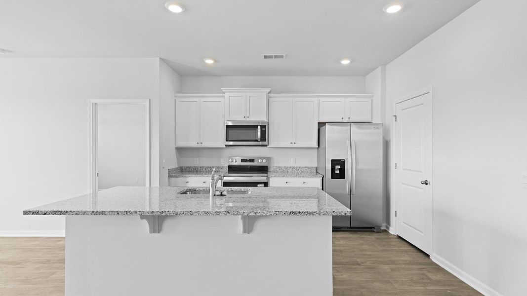 Furnished interior view inside a new home in The Ranch, Holly Hill (Image 7).