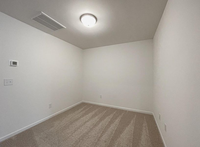 Spacious, unfurnished interior of a new home in East Main Townes, Spartanburg (Image 21).