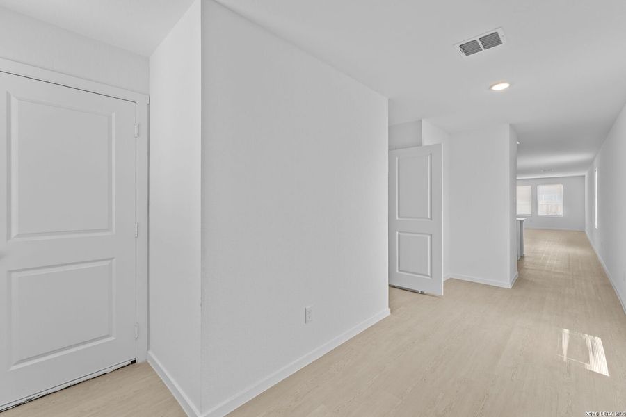 Spacious, unfurnished interior of a new home in Higdon Crossing, San Antonio (Image 11).
