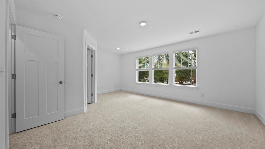 Spacious and serene primary suite with thoughtful design in a desirable DRB Homes community in Spartanburg, SC