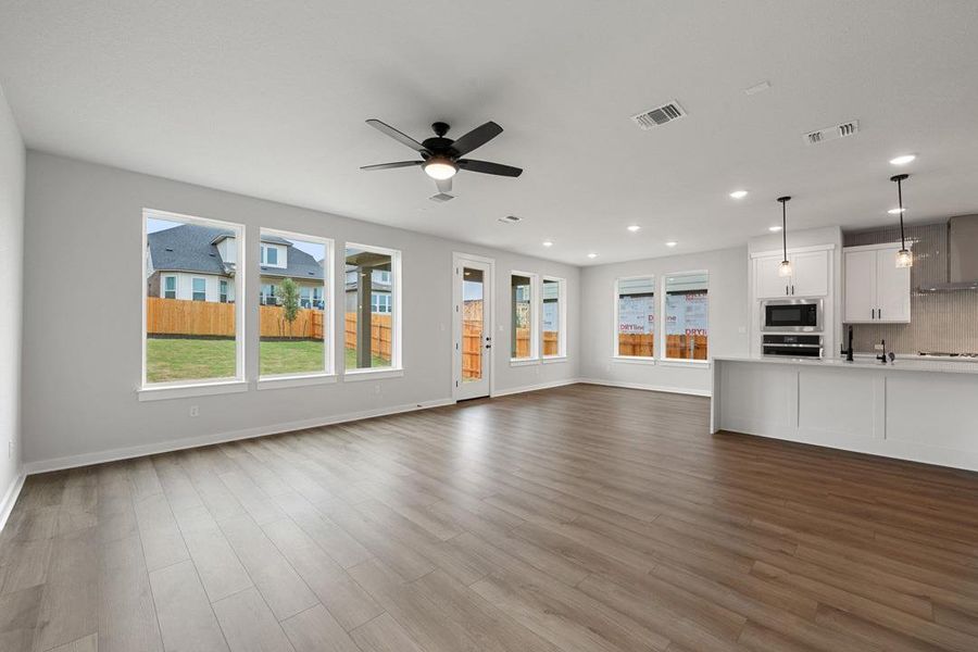 Spacious, unfurnished interior of a new home in Heritage, Dripping Springs (Image 20).