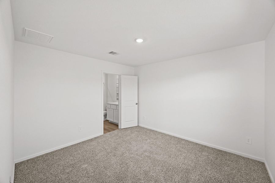 Spacious, unfurnished interior of a new home in The Canopies, Splendora (Image 15).