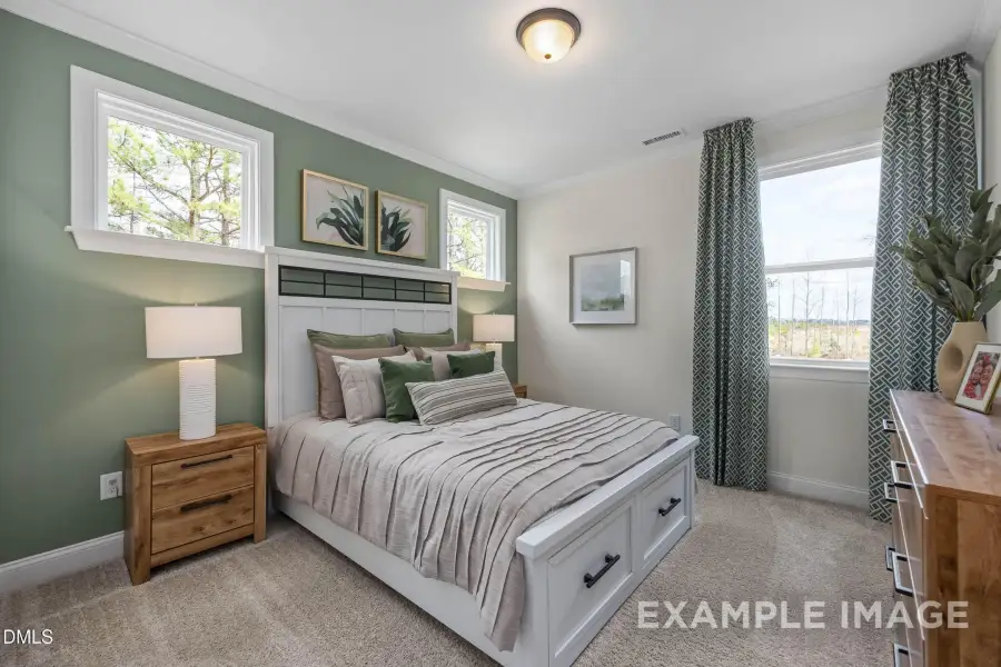 Furnished interior view inside a new home in Addison West, Holly Springs (Image 11).