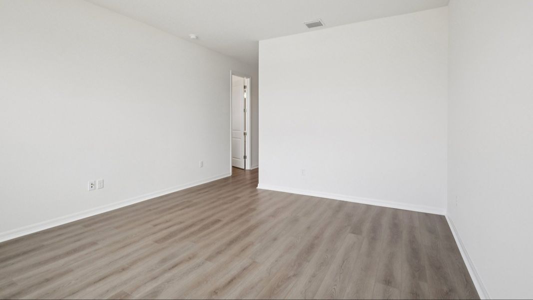 Furnished interior view inside a new home in Isla Mirada, San Antonio (Image 31).
