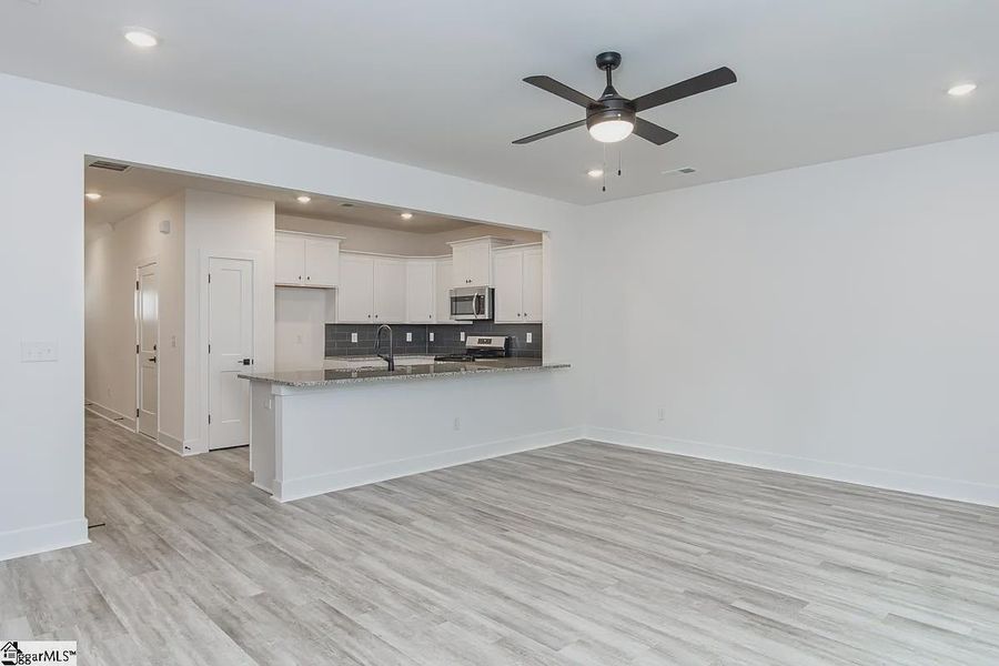 Representative unfurnished interior of a home built from the 1568 Townhome by Adams Homes in Parkstone Place Townhomes, Roebuck (Image 9). Representative unfurnished interior of a home built from the 1568 Townhome by Adams Homes in Parkstone Place Townhomes, Roebuck (Image 9).
