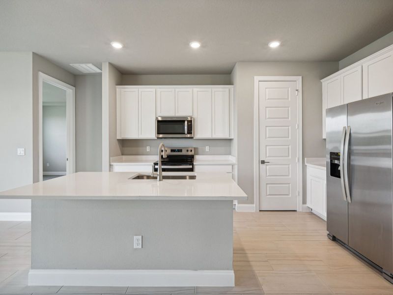 Kitchen in the Bergamo floorplan at 8984 Dahlia Circle