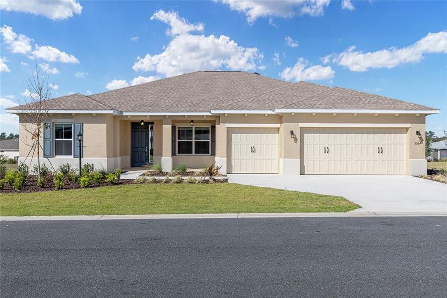Front exterior of a new home in , Ocala, FL, highlighting curb appeal (Image 17).