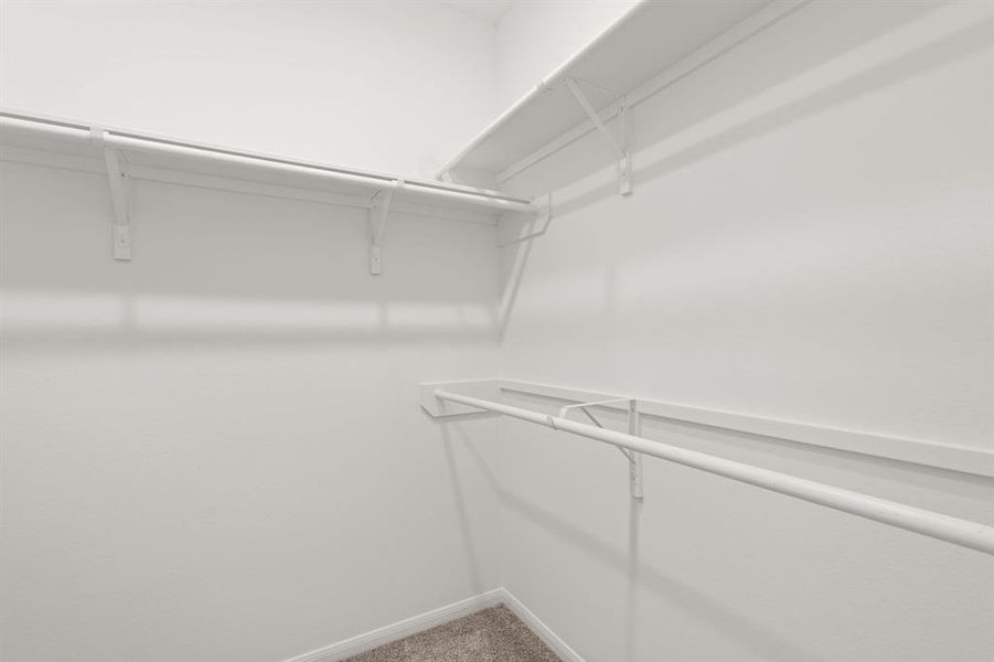 A view of your large primary walk-in Closet