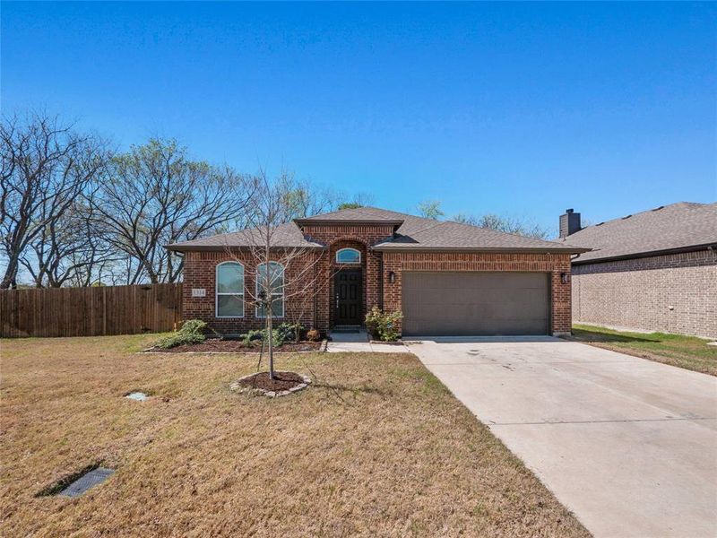 Front exterior of a new home in Anderson Crossing, Trenton, TX, highlighting curb appeal (Image 2). Front exterior of a new home in Anderson Crossing, Trenton, TX, highlighting curb appeal (Image 2).