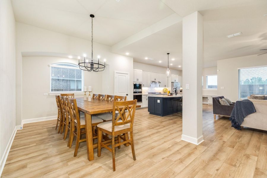 The dining area, family room, and kitchen are all open to each other, which is great for entertaining.