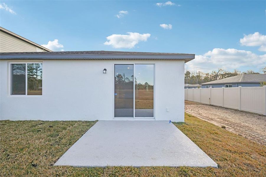 Exterior details and patio area of a home in Leyland Preserve - Premier Series, Brooksville (Image 4).