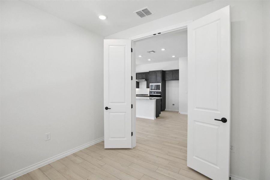 Spare room featuring recessed lighting and light wood-style floors