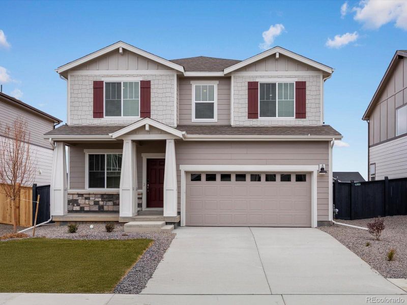 Front exterior of a new home in Westgate, Greeley, CO, highlighting curb appeal (Image 1). Front exterior of a new home in Westgate, Greeley, CO, highlighting curb appeal (Image 1).