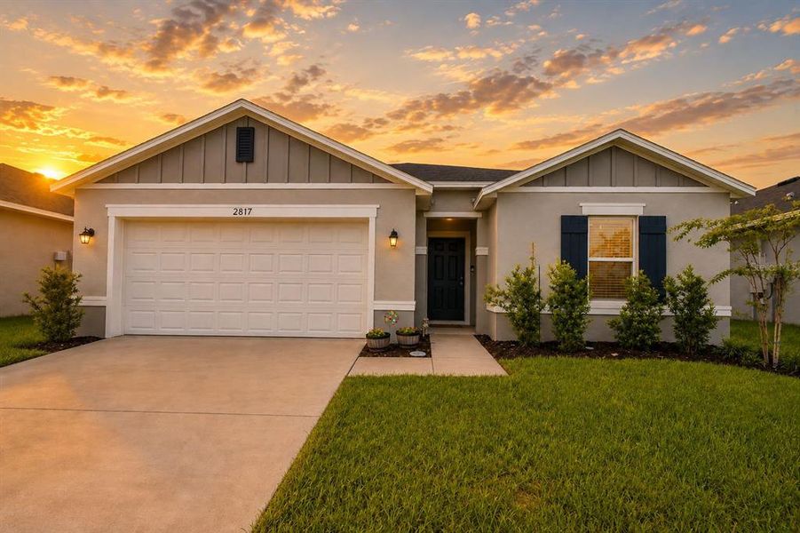 Front exterior of a new home in , Haines City, FL, highlighting curb appeal (Image 23). Front exterior of a new home in , Haines City, FL, highlighting curb appeal (Image 23).