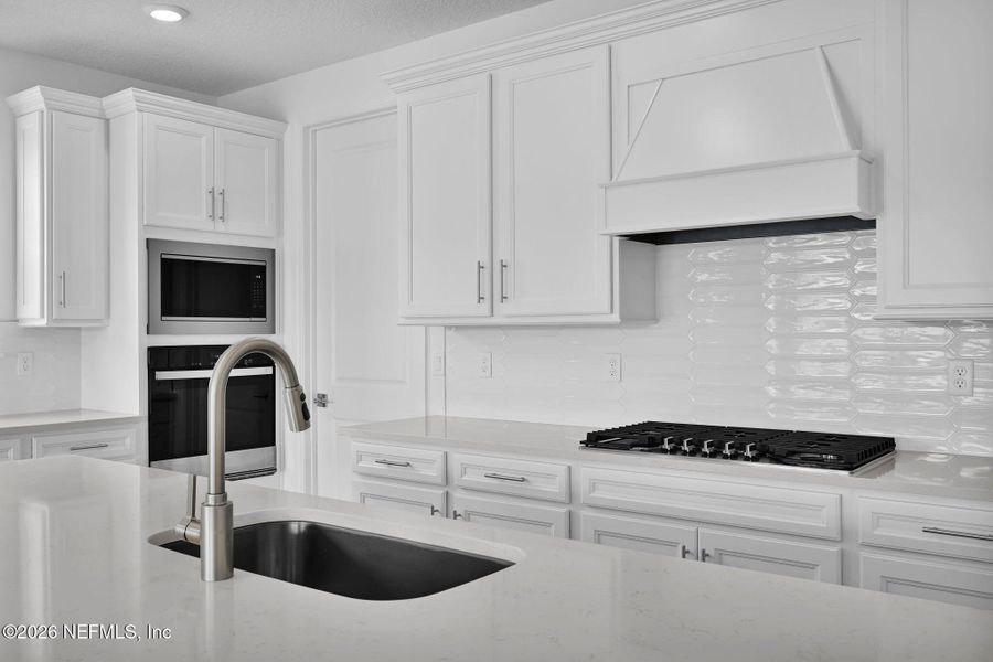 Furnished interior view inside a new home in Summer Bay at Grand Oaks, St. Augustine (Image 13).