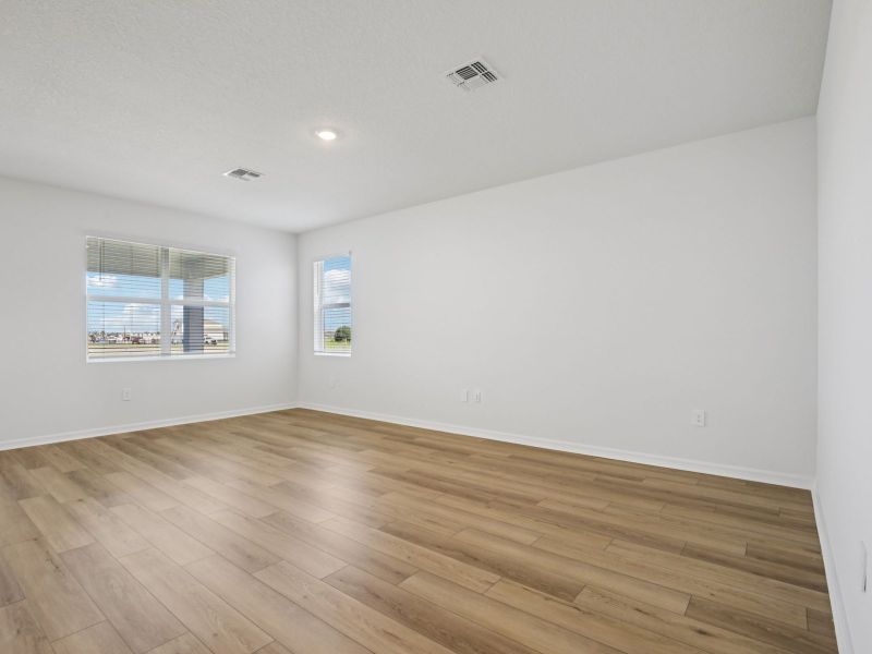 Spacious, unfurnished interior of a new home in Coasterra - Reserve Series, Palmetto (Image 9).