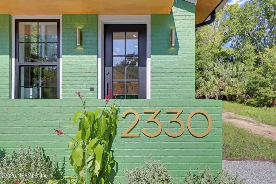 Front exterior of a new home in , Jacksonville, FL, highlighting curb appeal (Image 25).