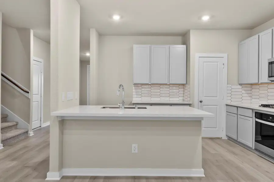 Furnished interior view inside a new home in Westridge Cove 50', Conroe (Image 7).