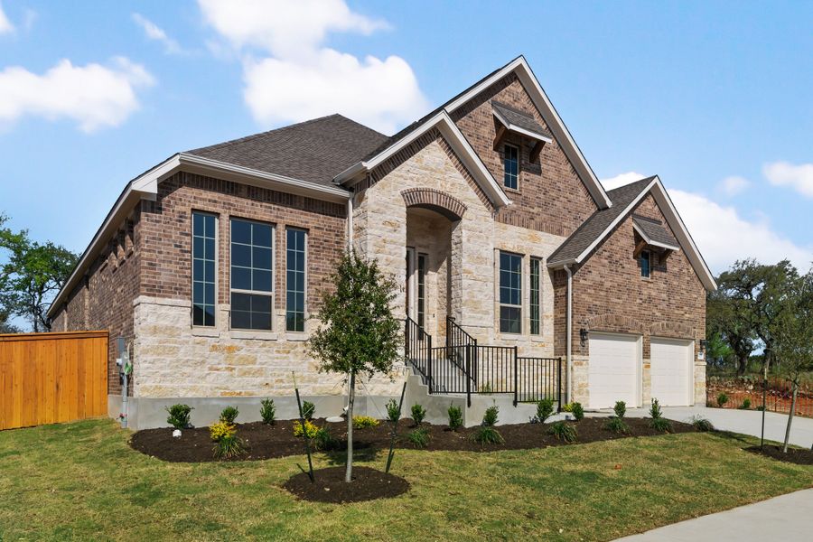 Representative exterior photo of a completed home built from the Maxwell by Ashton Woods in The Estates at La Cima, San Marcos, TX (Image 24). Representative exterior photo of a completed home built from the Maxwell by Ashton Woods in The Estates at La Cima, San Marcos, TX (Image 24).