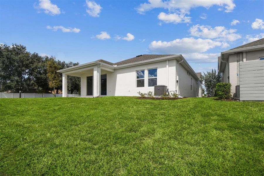 Exterior details and patio area of a home in The Peninsula at Rhodine Lake, Riverview (Image 21).