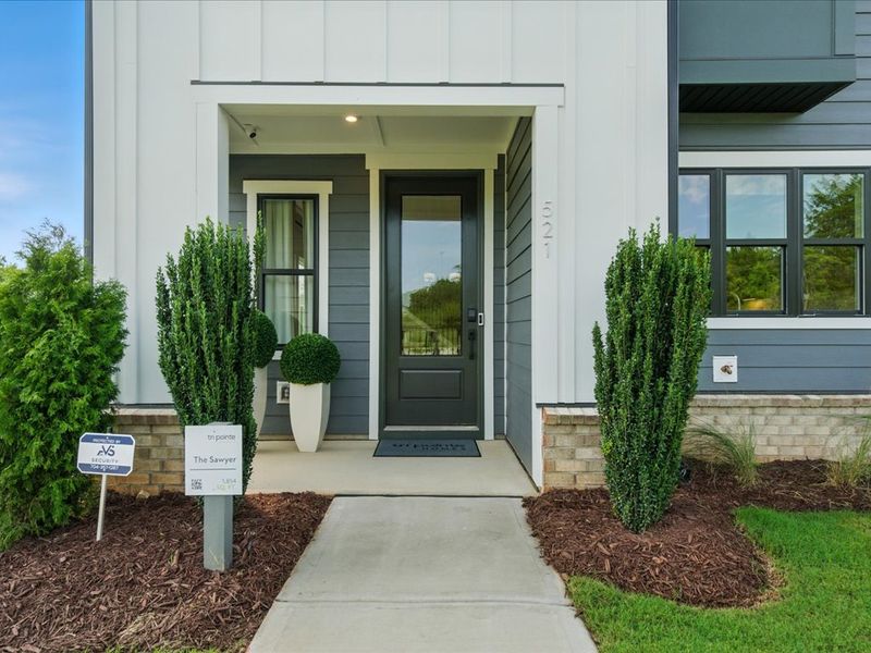 Front exterior of a new home in Grahym at Southbridge, Fort Mill, SC, highlighting curb appeal (Image 20).