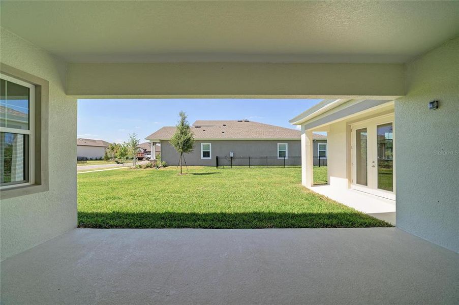 Exterior details and patio area of a home in Waterset, Apollo Beach (Image 2).