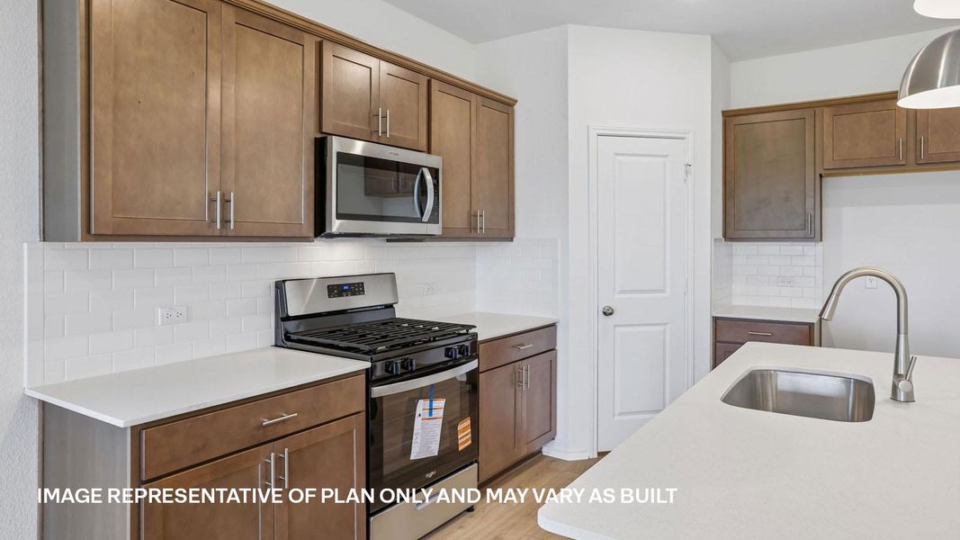 Representative furnished interior of a home built from the The Kendall by D.R. Horton in Valverde, Bastrop (Image 9).