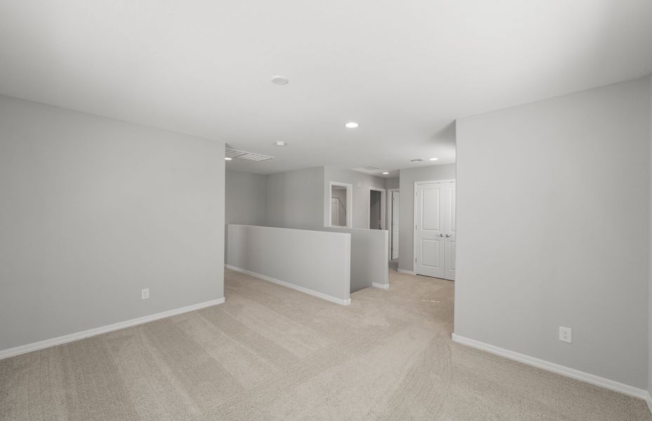 Spacious, unfurnished interior of a new home in Asante- Atrium Series, Surprise (Image 19).